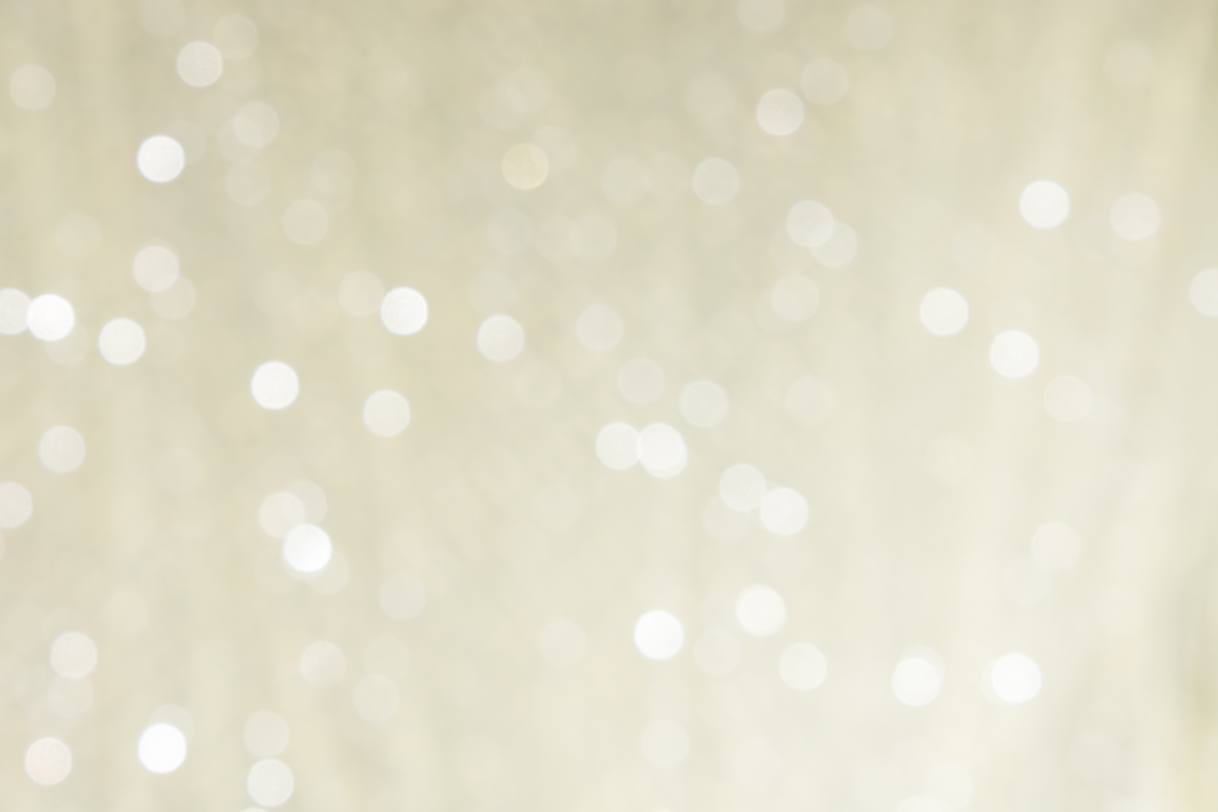 Defocused sparkly background, champagne colour.